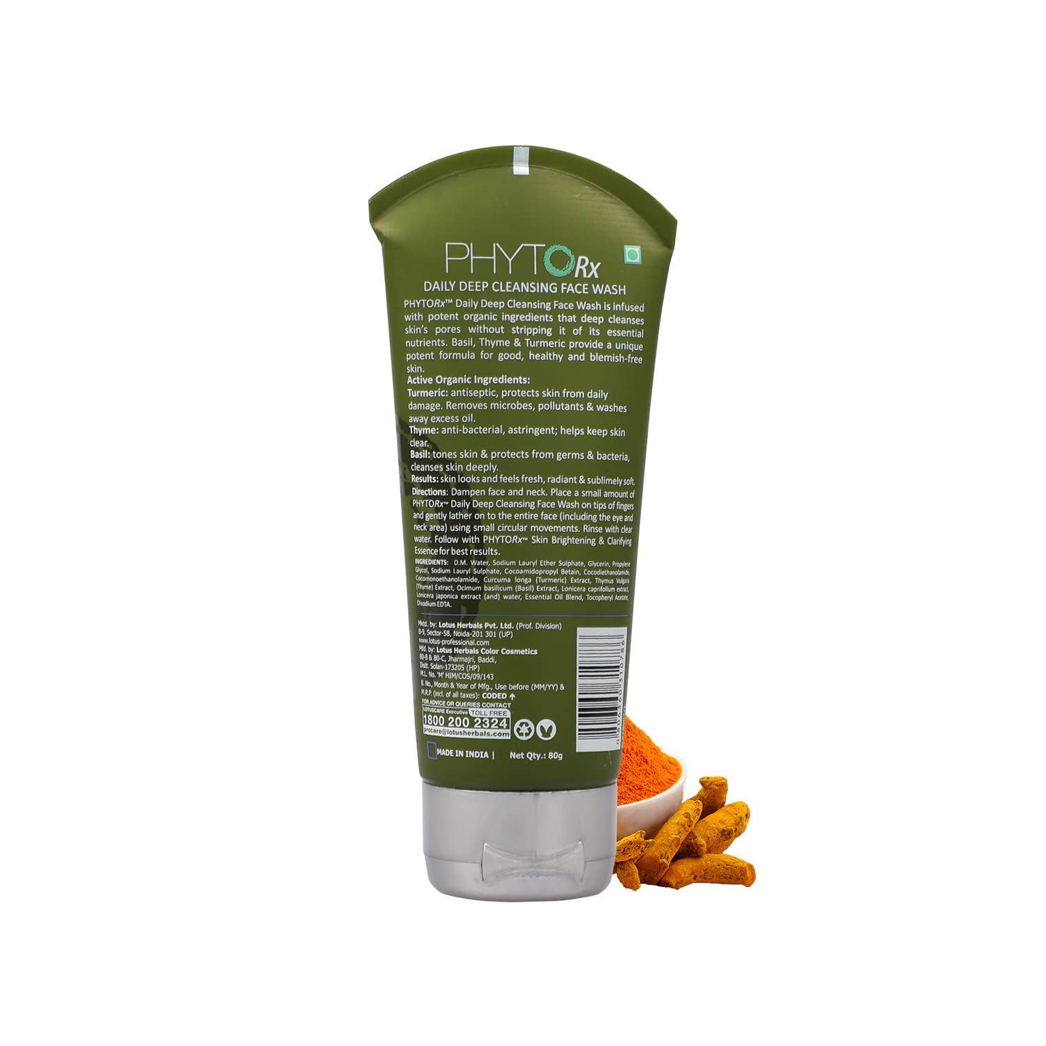 Green skincare product tube with turmeric and a bowl on a white background