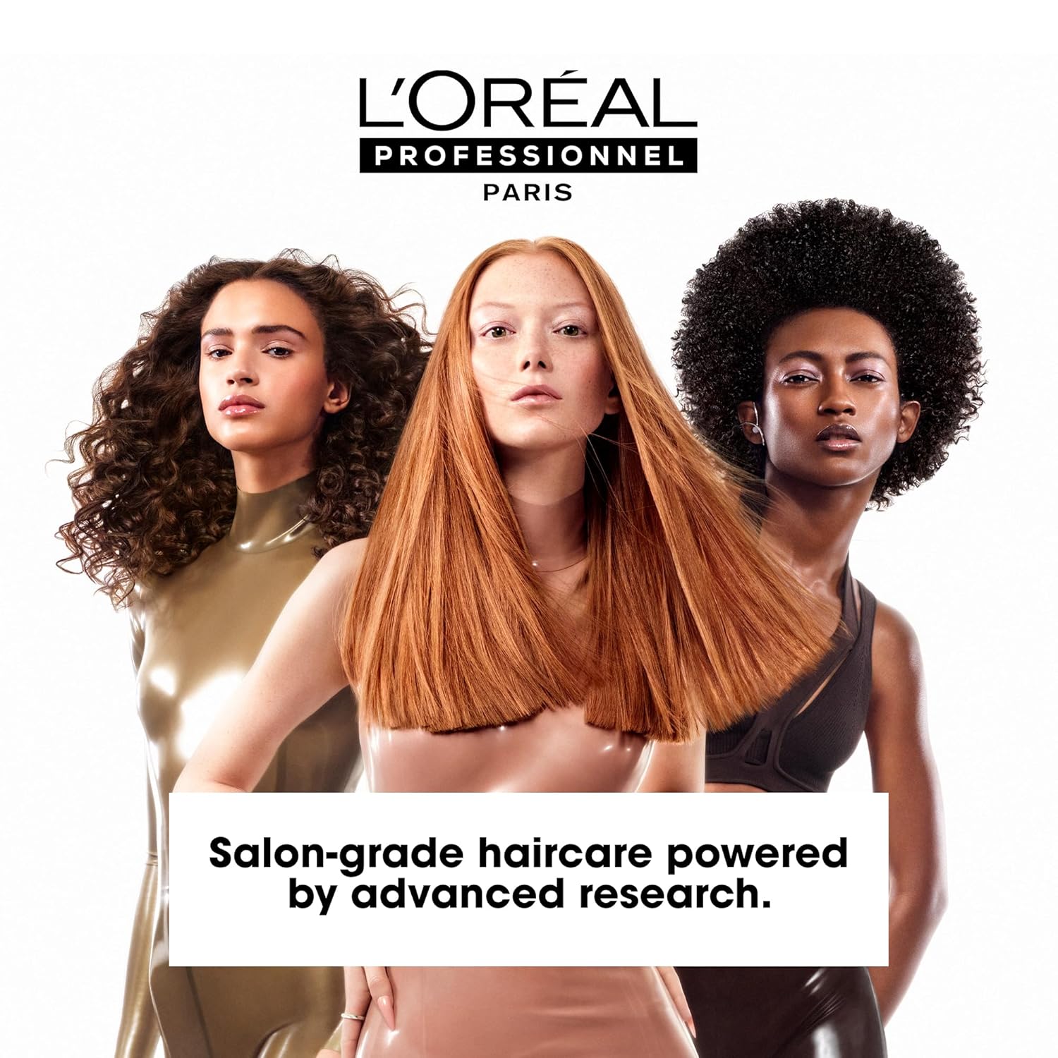 L'Oreal Professional advertisement with three women showcasing styled hair, featuring the L'Oreal logo.