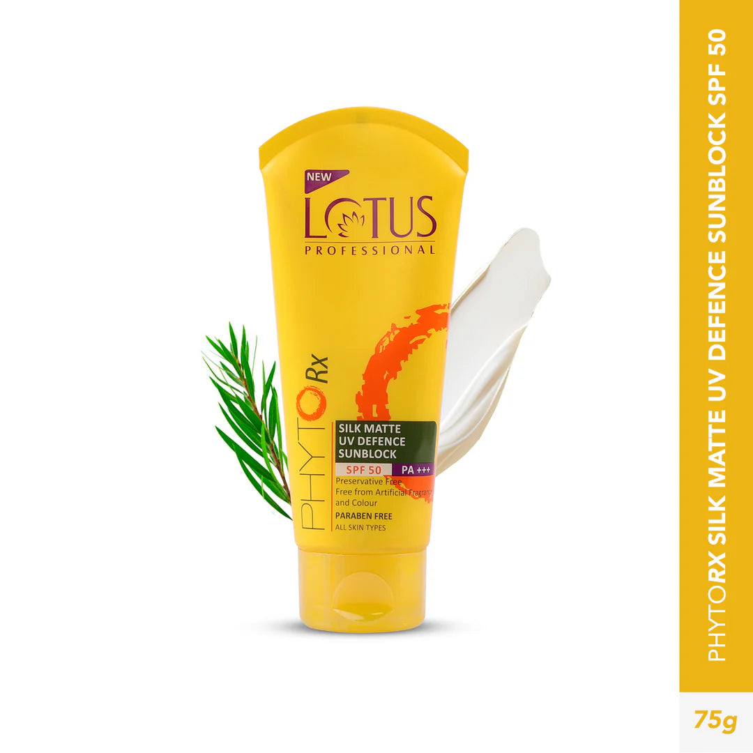 Yellow tube of Lotus Professional sunscreen with green leaf on a white background